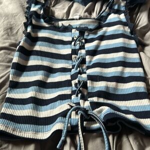 Colors: light and dark blue, white